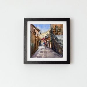 Inspired by a quiet walk through the narrow streets of Lake Como, this watercolor captures the beauty of light slipping across old stone steps and sunlit walls. Painted from memories of travel, the scene reflects the stillness and charm hidden within the lakeside villages of northern Italy. Soft washes, layered shadows, and warm earthy tones invite the viewer to wander upward through the passageway — toward somewhere unseen, yet familiar. A tribute to places we leave behind, but continue to carry with us long after the journey ends.